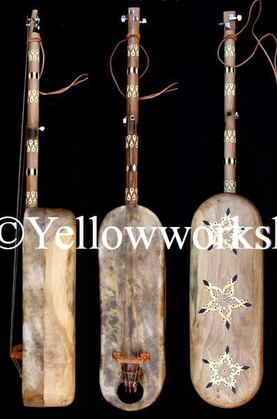gnawa´s musical instrument play guembri guembri for sale de guembri, la guembri gnaouacuture Moroccan Sintir also called Guembri bass guitar De Marokkaanse basguitar guembri tuning what is the correct tuning for the 3 stringed morrocan bass How to tune the guimbri